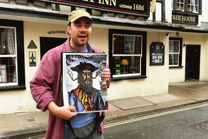 Blackbeard to Banksy Tour guide Owen, Showing a picture of Blackbeard on a Bristol Walking Tour